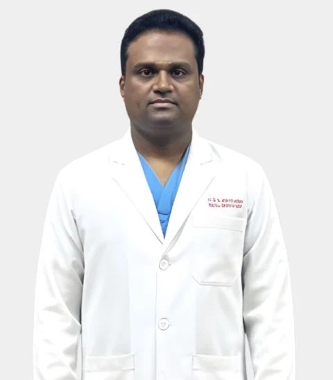Dr. S.N. Manikandan, Spine Specialist at Aditya Hospital, in a white coat, sharing insights on the benefits of endoscopic spine surgery for faster recovery and minimal complications.